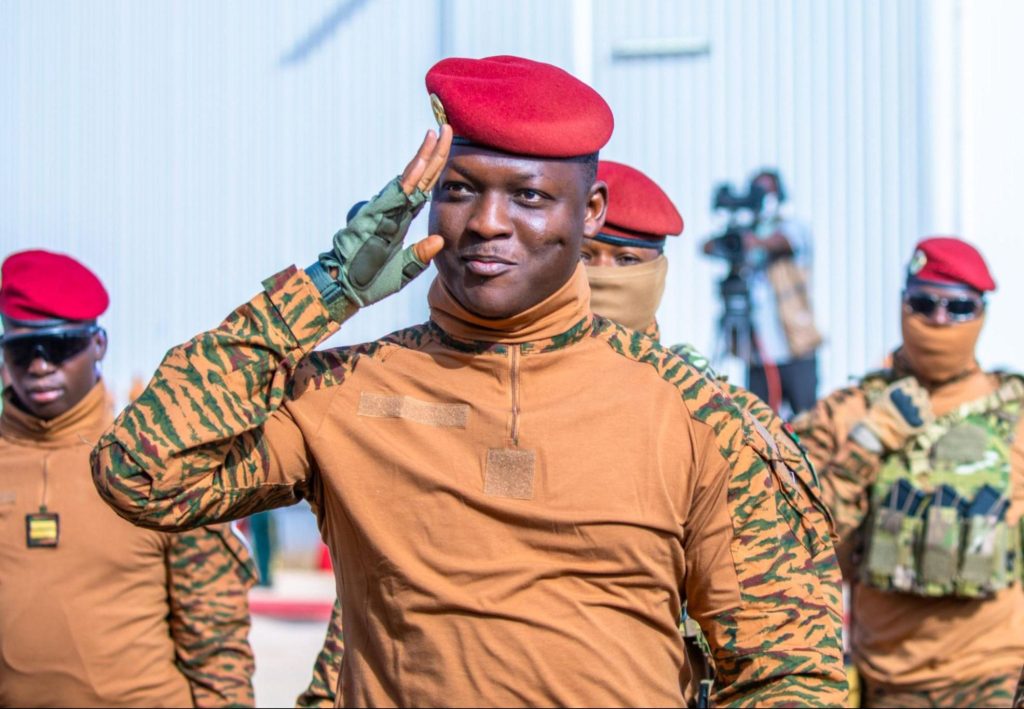 Captain Ibrahim Traoré, Head of State of Burkina Faso, salutes confidently, representing a new wave of African-centered leadership.