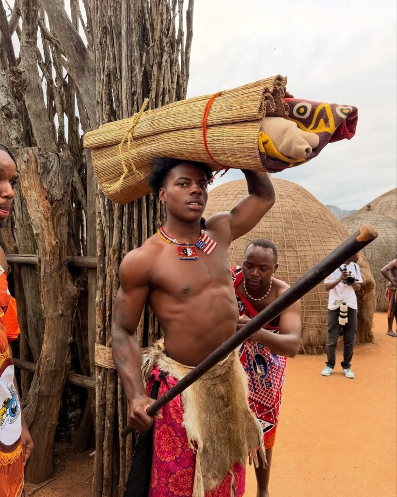 Global influencer IShowSpeed participates in a cultural ceremony in Eswatini, carrying a communal load to demonstrate the principles of UBUNTU-nomics.