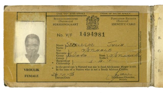 Historical South African Natives Identity Card (Passbook) for Julia Sebelecoe, showing racial and tribal classification under apartheid law