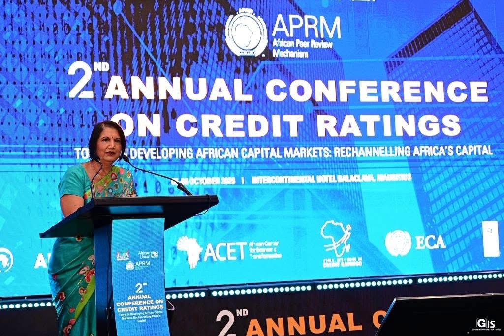 Hon. Jyoti Jeetun speaks at a podium during the launch of the African Credit Rating Agency in Mauritius.